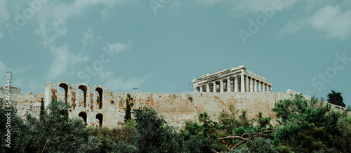 Odeon of Herodes Atticus and Parthenon in Athens, Greece photo