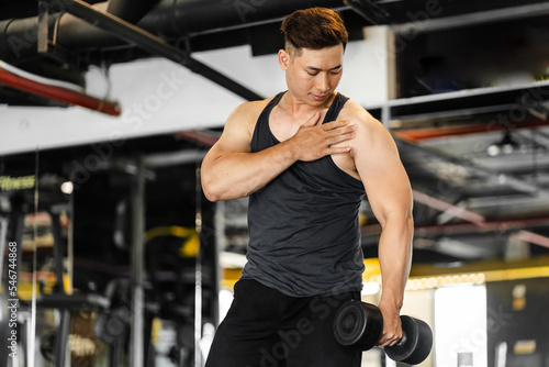 portrait Asian man working out in the gym