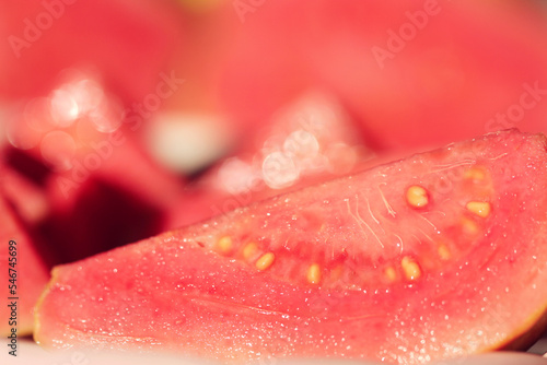 close up of red guava slices