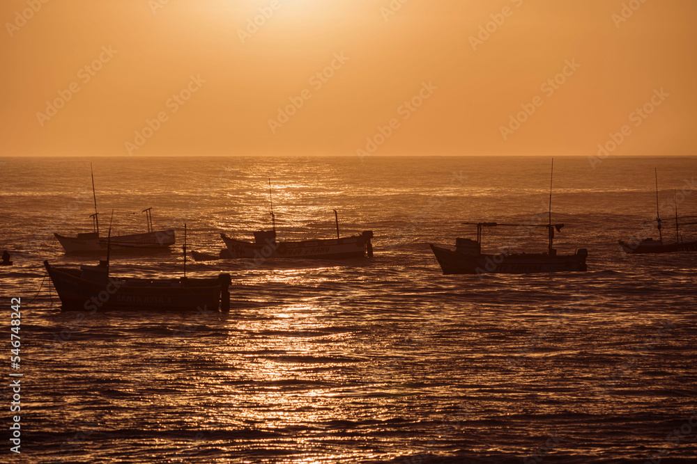boat on the sea at sunset