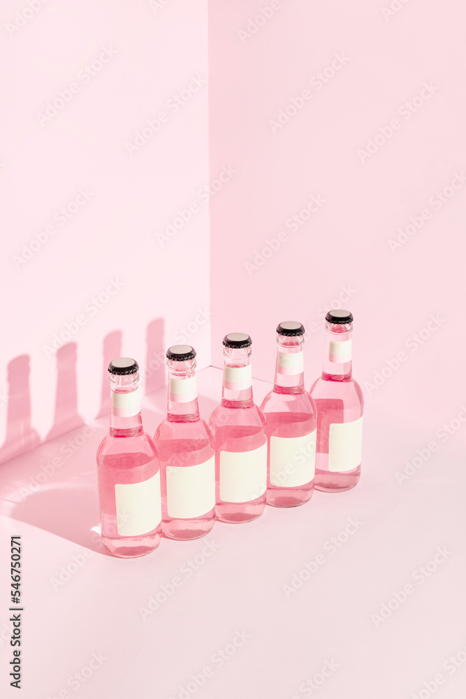 Angle view of pattern made of bottles full of refreshing liquid. Angle view of pattern made of bottles full of refreshing liquid.