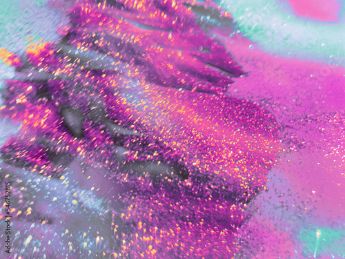 Sparkling elusive glitter background in vibrant colors photo