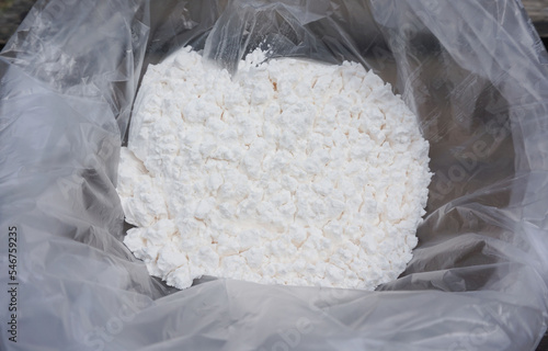 White baking powder in a transparent plastic bag for baking