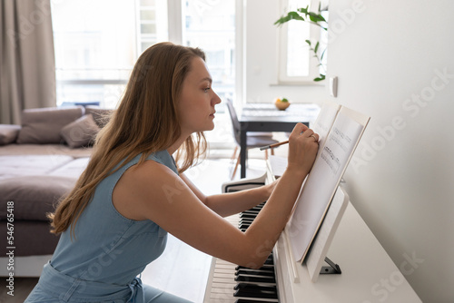 Woman Composing Music Piece