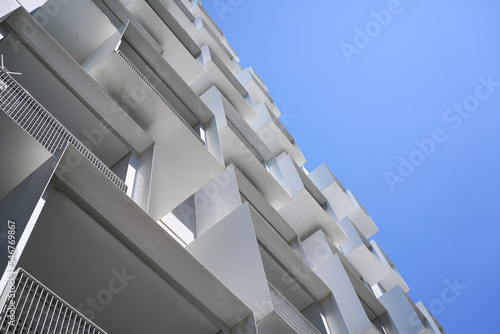 White metal facets of apartment building detail photo