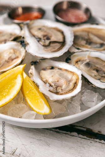 Half Dozen Freshly Shucked Oysters On Ice