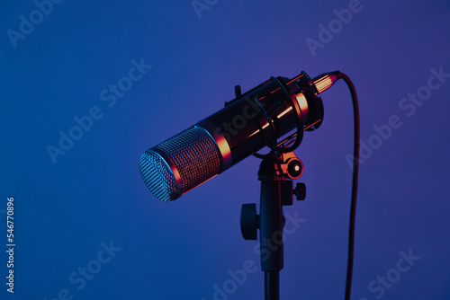 microphone in a studio with colored lights