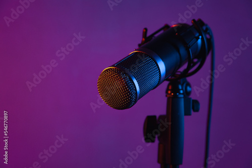 microphone in a studio with colored lights