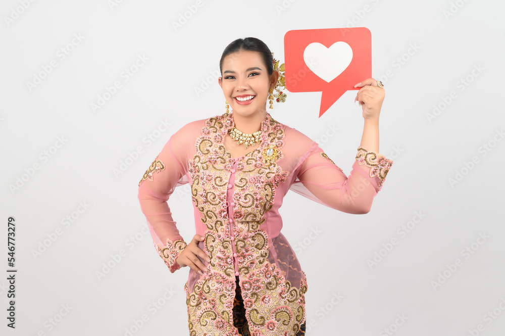 Young beautiful woman dress up in local culture in southern region with speech bubble Young beautiful woman dress up in local culture in southern region with speech bubble