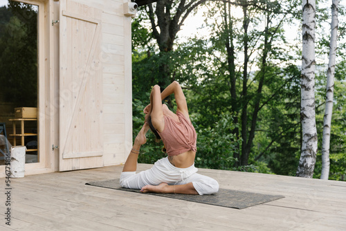 Woman Spending Her Time Doing Yoga photo