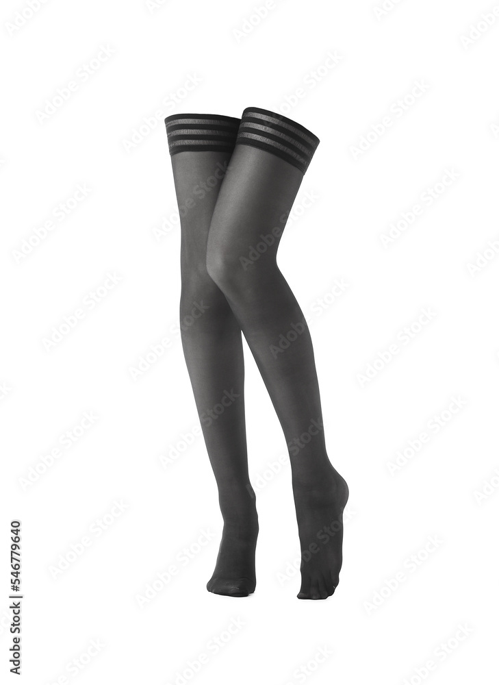 Legs of beautiful woman in black stockings isolated on white Legs of beautiful woman in black stockings isolated on white