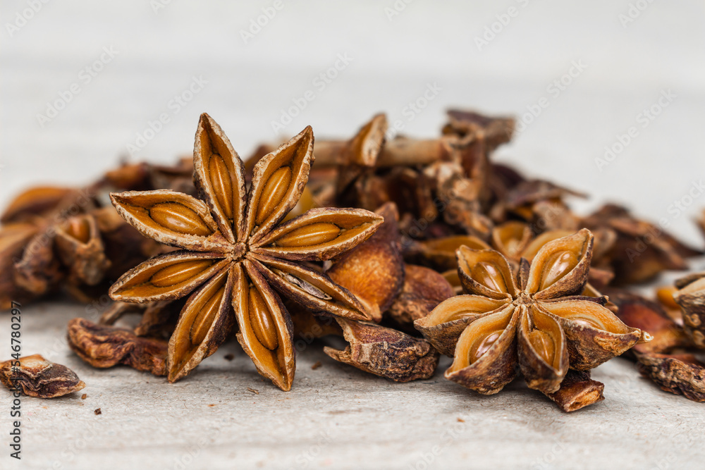 star anise on brown paper background front view close up. star anise on brown paper background front view close up.