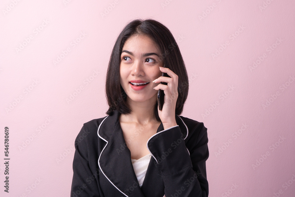 Young woman calling on phone isolated on background Young woman calling on phone isolated on background