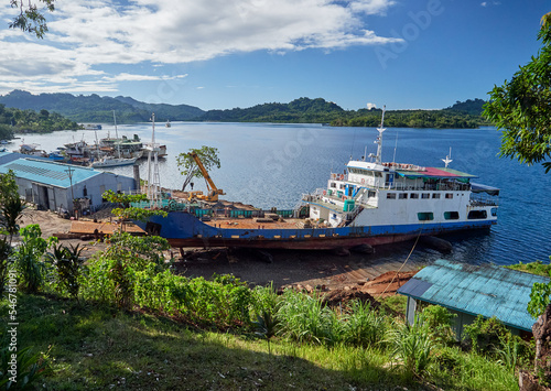 Shipyard dry-dock repairs to inter-island cargo barge, Tulagi harbor photo