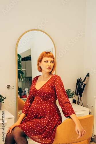 Portrait of Beautiful Pregnant Red Haired Woman  photo