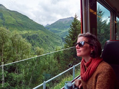 Slow travel: Swiss Alps Glacier Express train, carriage open window
