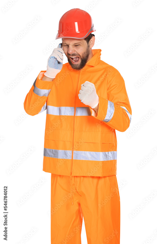 Man in reflective uniform talking on smartphone against white background