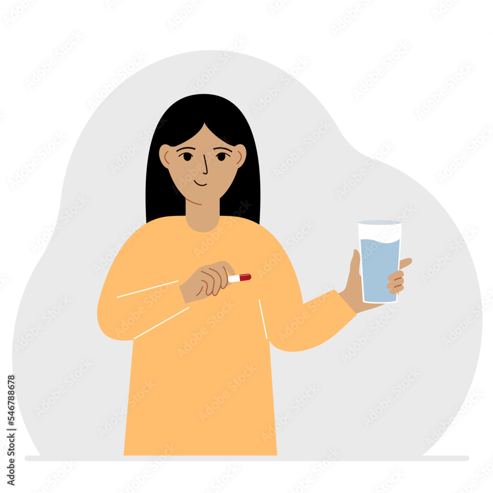 A woman in one hand holds medicine or a pill in another glass of water. The concept of taking medicine to treat diseases, taking vitamins or food supplements with water.