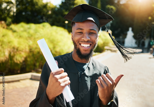 Student graduation, black man with certificate in outdoor park or portrait of goal achievement in African university campus. Education success, happy graduate with college diploma or law scholarship photo