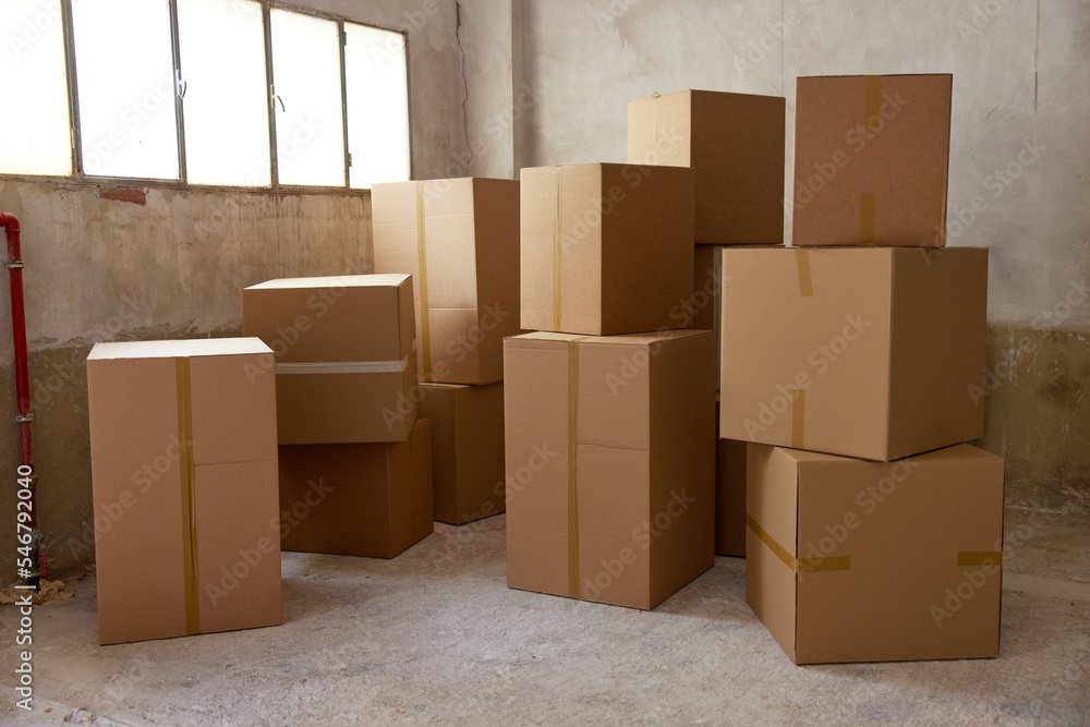 Carton boxes in spacious warehouse Carton boxes in spacious warehouse