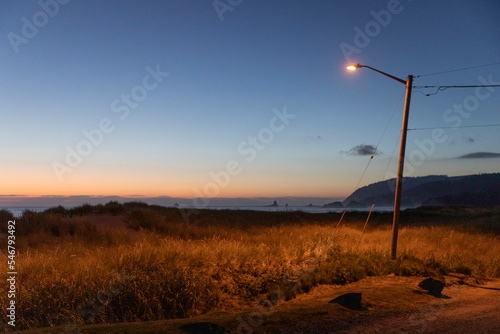 Oregon Coast landscape single Streetlight at sunset   