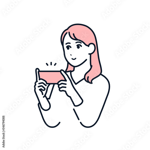 スマホでゲームをする若い女性のシンプルなベクターイラスト素材
