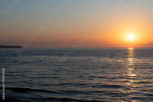 Beautiful orange sunset over the sea with soft selective focus. Beauty of nature concept