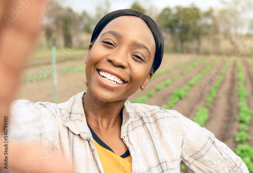 Obraz na płótnie Agriculture, farm and selfie of happy black woman smiling and taking picture outdoors