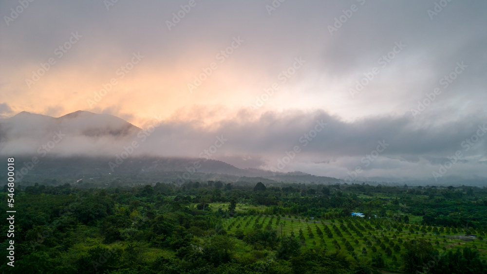 Naklejka premium Mountain and road with Sunrise in localside
