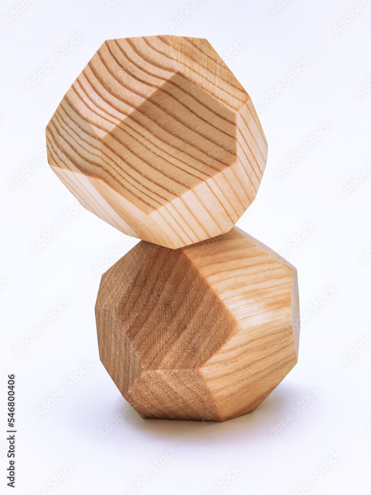 TUMI ISHI wood rocks on the white background. Close-up TUMI ISHI wood rocks on the white background. Close-up