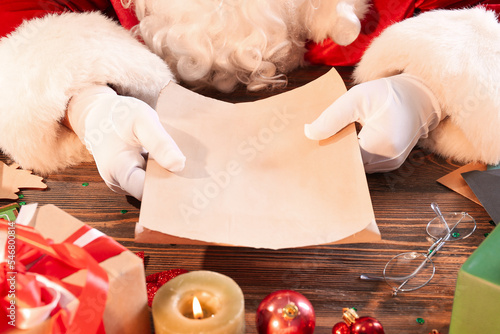 Santa Claus holding blank l...