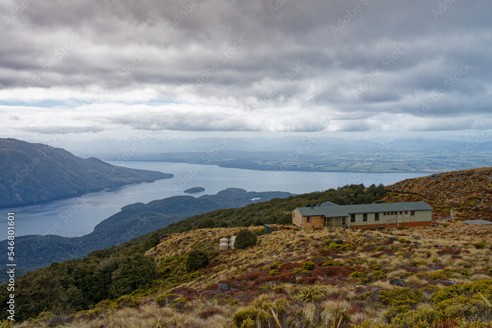 Mount Luxmore hut overlooking Lake Te Anau from the Kepler Track.