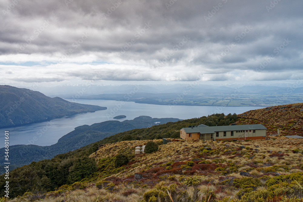 Fototapeta premium Mount Luxmore hut overlooking Lake Te Anau from the Kepler Track.