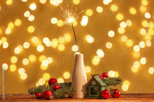 Sparkler in a white vase wi...