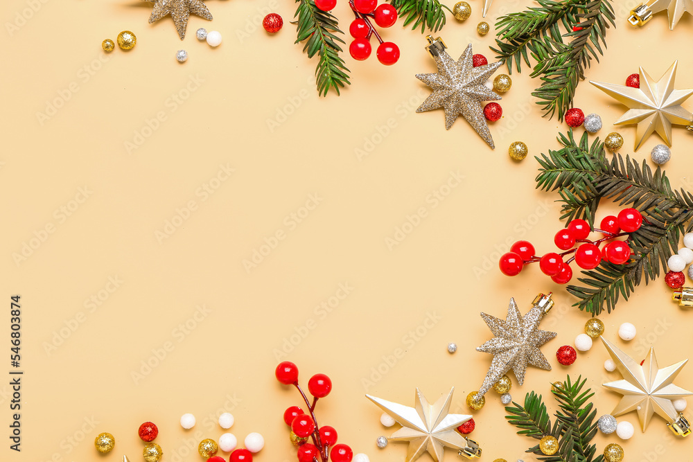 Christmas composition with beautiful decorations and fir branches on color background