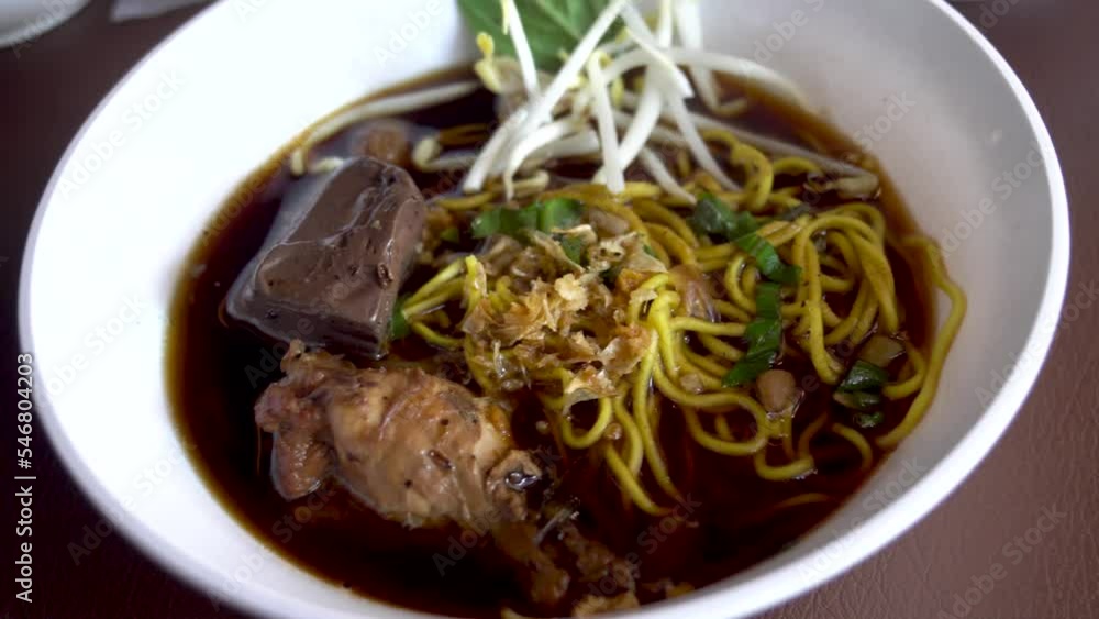 Braised chicken wings chicken feet chicken blood bitter gourd noodle.food lunch.Bitter Gourd Chicken Noodle with Herb. Braised chicken wings chicken feet chicken blood bitter gourd noodle.food lunch.Bitter Gourd Chicken Noodle with Herb.