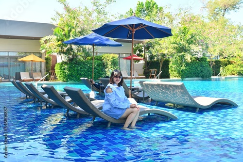 woman relaxing in the pool