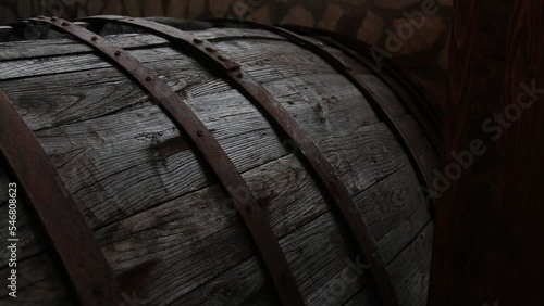 Oak barrels in underground wine cellar. Wine Barrels in Italy