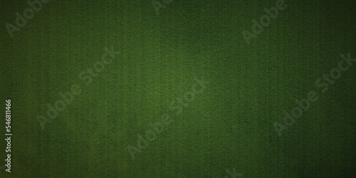 Green texture background . elegant dark emerald green background with black shadow border and fabric  grunge texture design .