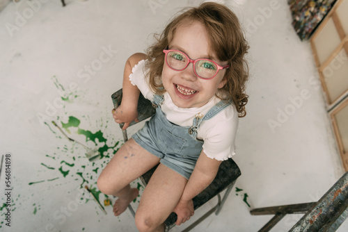 child drawing on wall photo