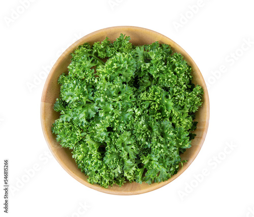 Fresh parsley herb in wood bowl isolated on transparent png