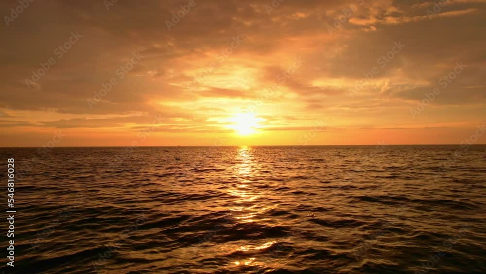 4k Silhouette Video Reverse Motion sunset light on the beach aerial view Sea view and cloudy sunset sky 4k Silhouette Video Reverse Motion sunset light on the beach aerial view Sea view and cloudy sunset sky