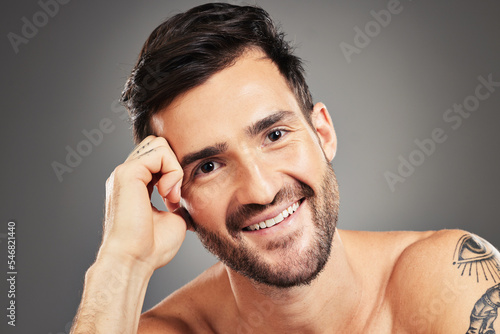 Face, skin and man in skincare or beauty portrait, facial with grooming and natural cosmetics, pose against studio background. Fresh, wellness and isolated in male cosmetic treatment mock up.