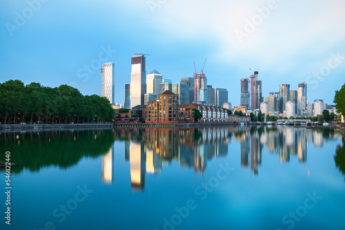 London cityscape Canary Wharf with reflection from Greenland Dock