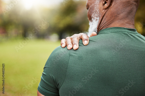 Foto Shoulder, pain and injury with a senior black man holding his joint, sore with inflammation outdoor during exercise