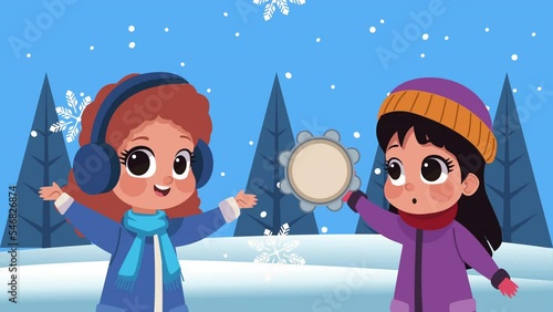 little girls wearing winter clothes in snowscape