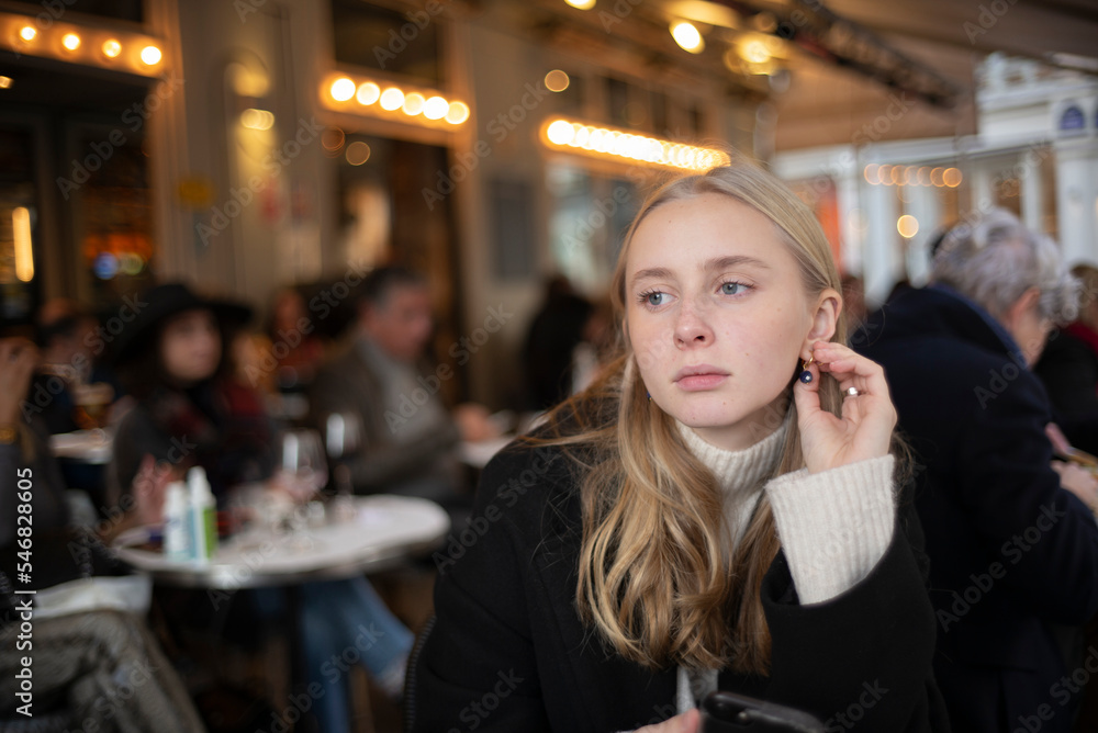 Teenage girl sitting at cafe Teenage girl sitting at cafe