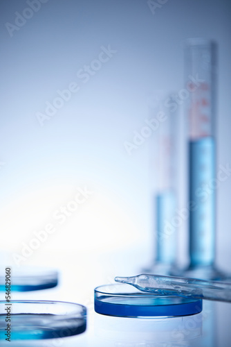 blue solution in test tube and pipette