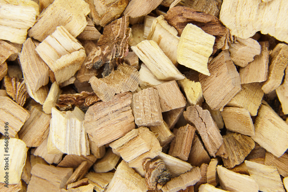 Wood chips for smocking texture background. Natural wood smoking chunks, top view Wood chips for smocking texture background. Natural wood smoking chunks, top view