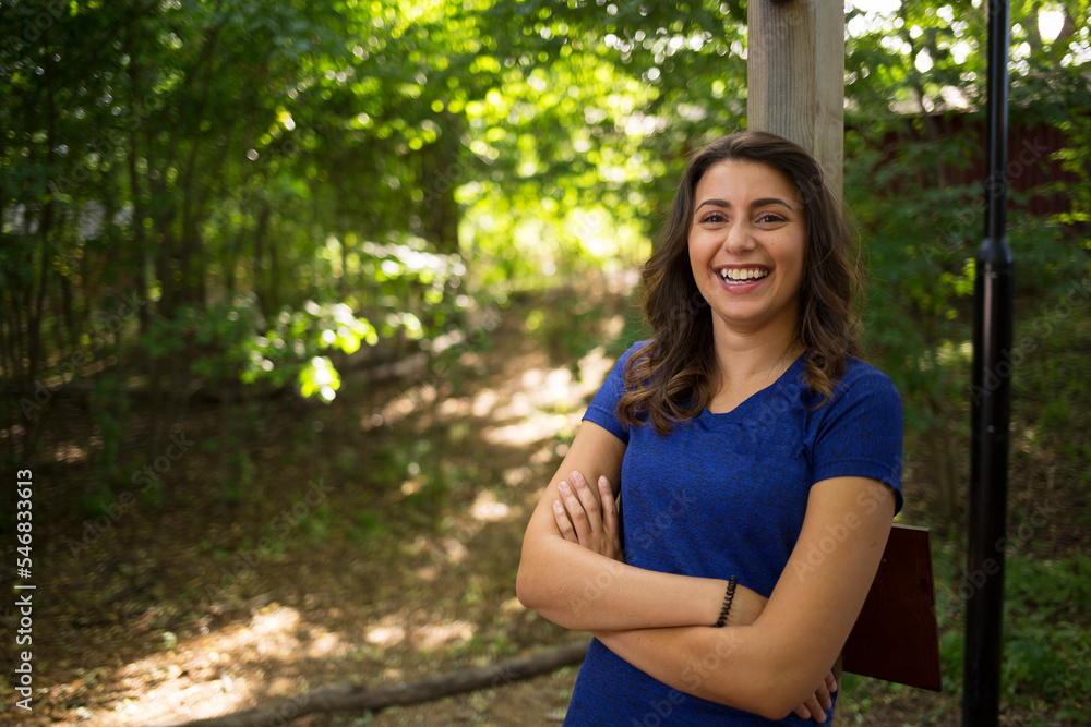 Smiling young woman in forest Smiling young woman in forest